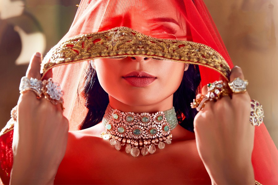 Wedding is the most important day in a woman’s life - keeping that in mind, our craftsmen work tirelessly on delivering fine interlaced sets for your memorable day. We offer you the purest form of Polki, the superior twin of Kundan, crafted out of uncut diamonds, reminiscent of  India’s erstwhile royal heritage. Zewar’s alluring jewellery is a family heirloom that can be passed for generations to come. Just like gold and diamonds are in the purest form so is the spirit of a wedding where two people devote to build their foundation in the purest form of love and trust. Our maestro designer will sketch a unique design and the expert stylist will guide you to the right design for your splendid wedding. We deliver top quality designs and jewellery with spotless craftsmanship and service to our beloved customers.